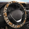 A steering wheel covered in a leopard cheetah print material inside a car