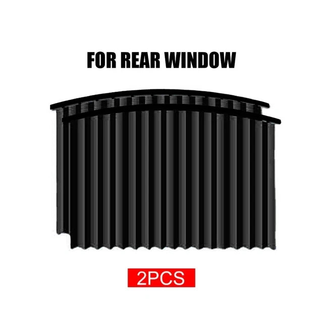 Two black magnetic car window sun shades for rear windows.