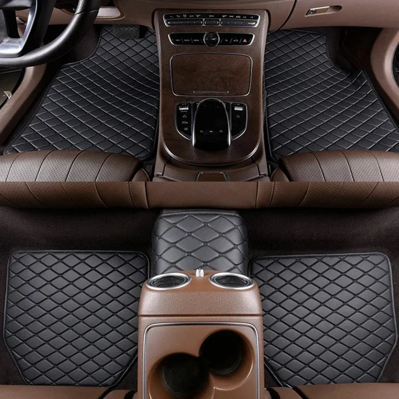 Interior view of a car with dark brown quilted floor mats and leather upholstery.