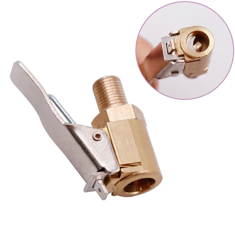 A portable inflatable tire pump with a brass fitting and metal body, shown in detail.