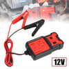 Portabler 12V Auto-Relais-Tester mit rotem Kabel und schwarzem Gehäuse neben einem Fahrzeugelektronikbauteil.