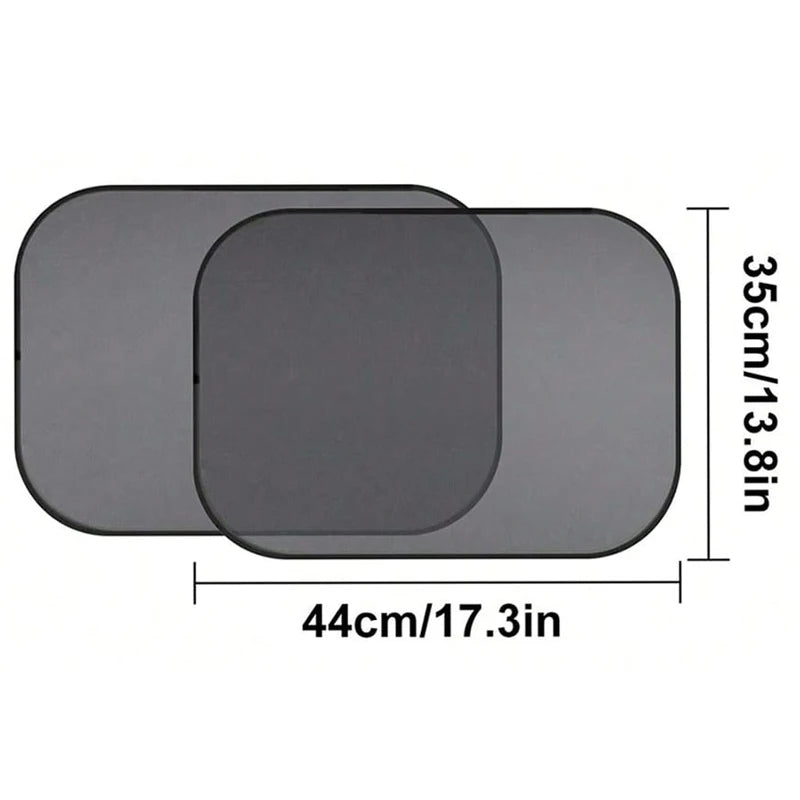 A pair of rectangular, dark gray car side window sun shades with dimensions 44cm by 35cm.