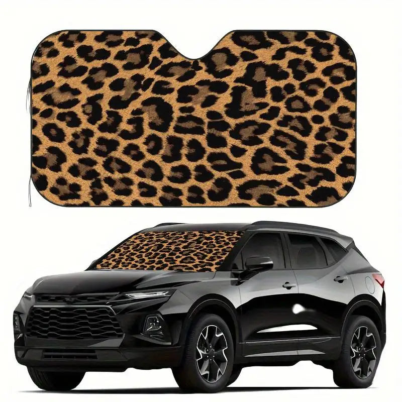 A leopard print car sunshade is shown on a black SUV.