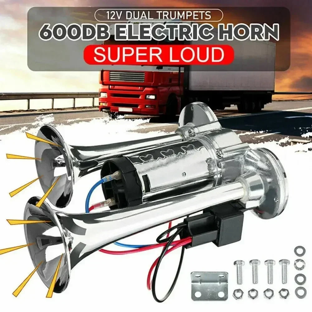 A chrome dual trumpet electric horn kit with mounting hardware and various fittings is shown in a daylight setting.