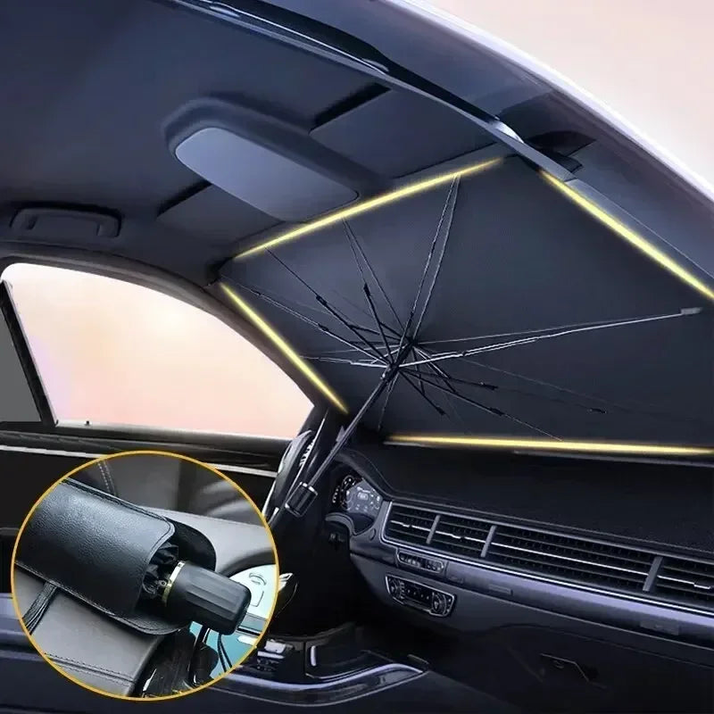 Vue intérieure d'une voiture montrant un pare-soleil anti-UV rétractable installé sur le pare-brise.