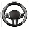 A black and silver steering wheel cover for a car, shown from above.