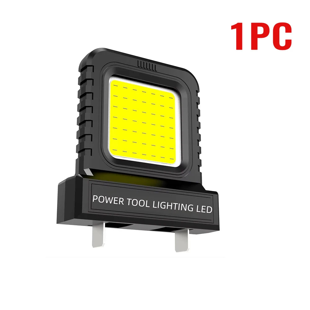 A black rectangular LED light module designed for power tools, featuring a bright yellow light panel.