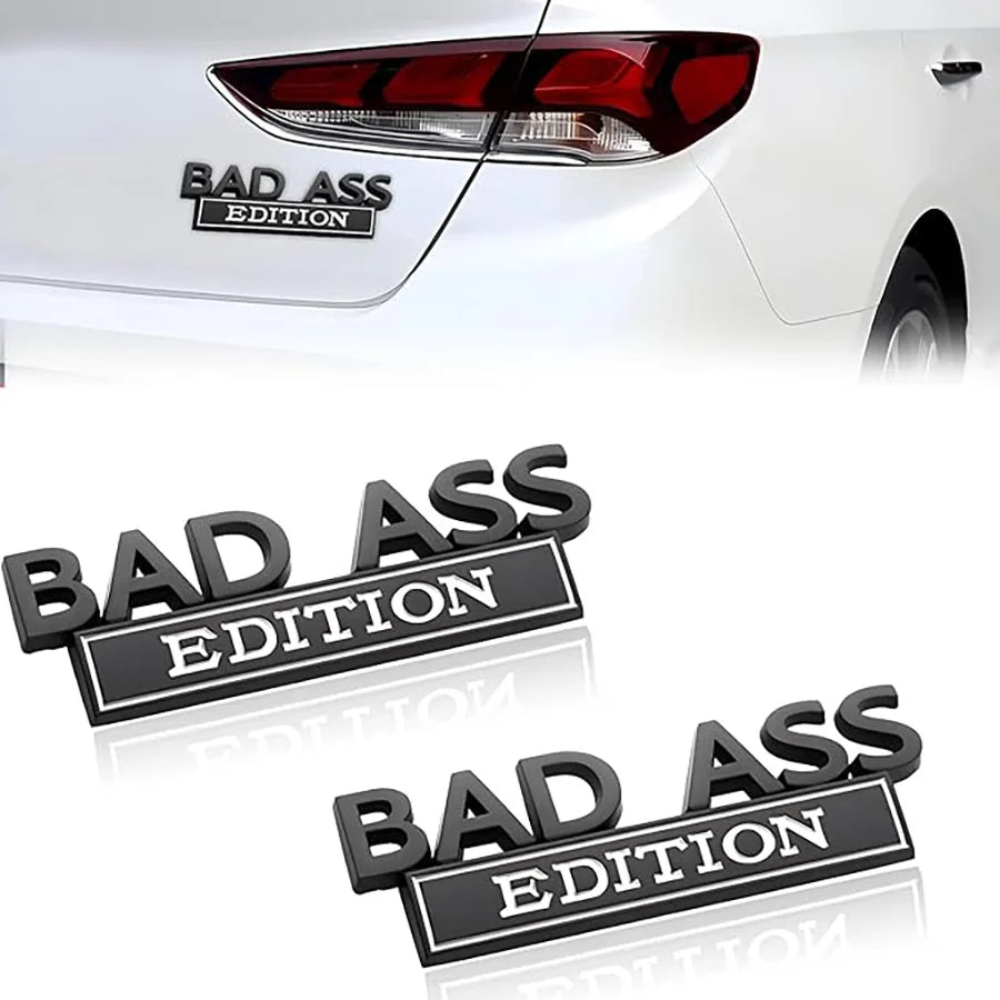 Black Bad Ass Edition logo decals applied to a white car's taillight area.