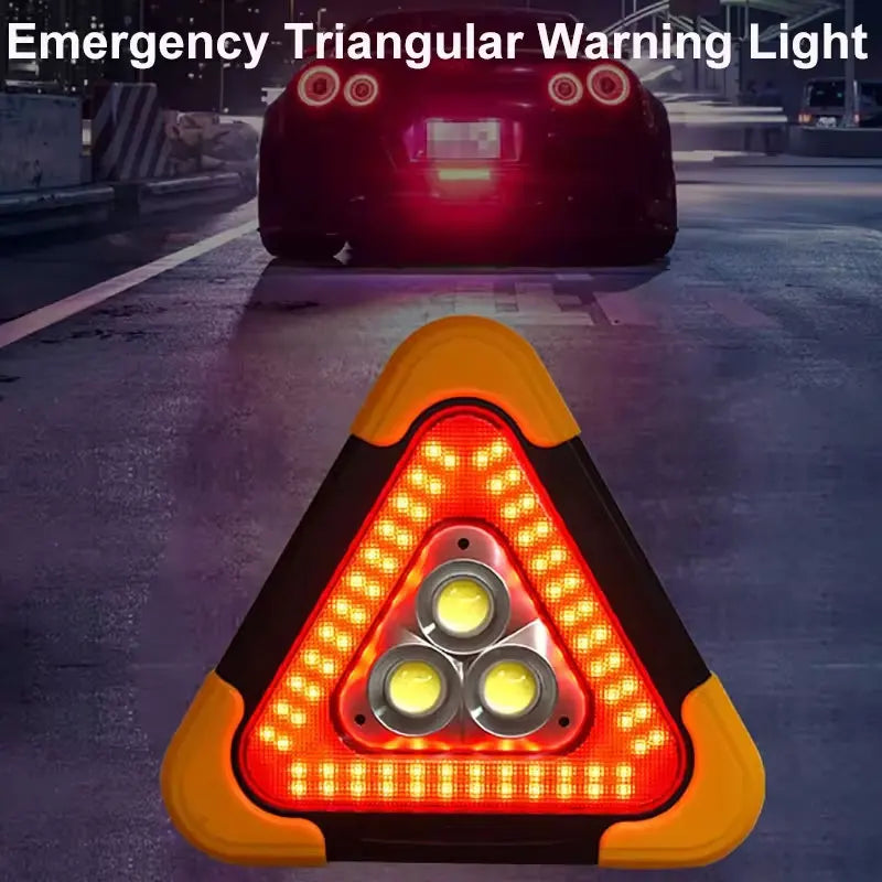 A close-up view of a triangular emergency warning light with three bright LED bulbs, set against a dark background.
