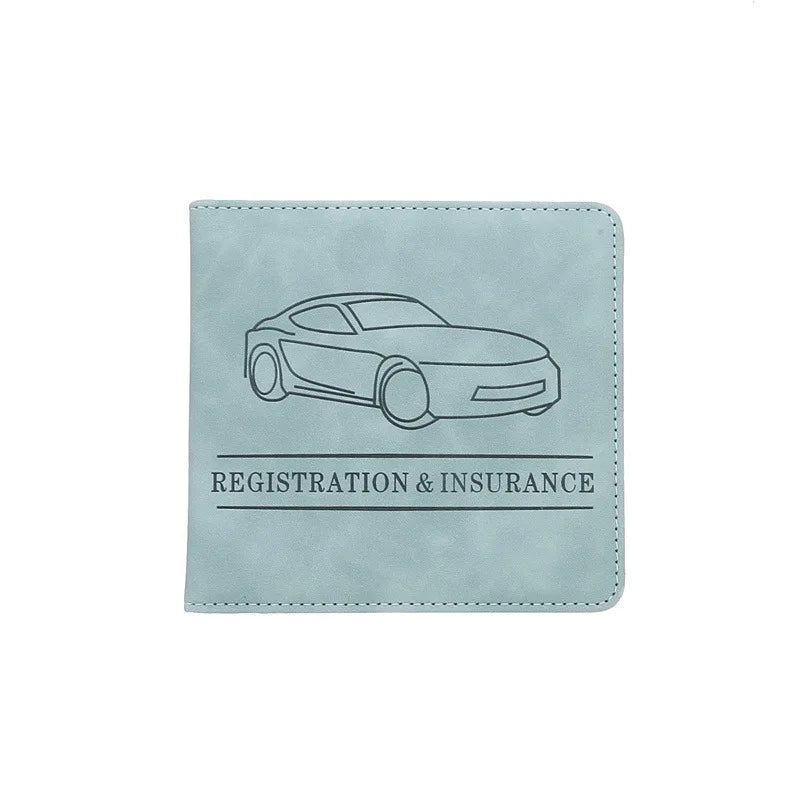 A light blue leather card holder featuring a line drawing of a car and the text Registration & Insurance.