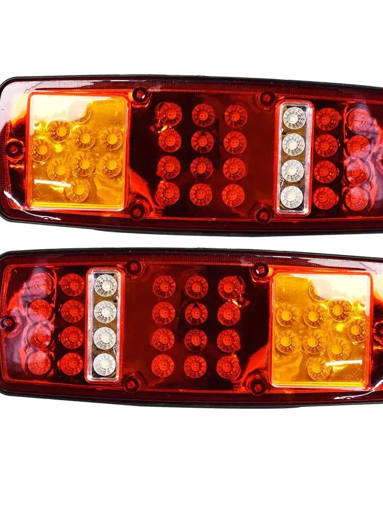 Dual high-brightness truck tail lights featuring red and amber LED clusters.