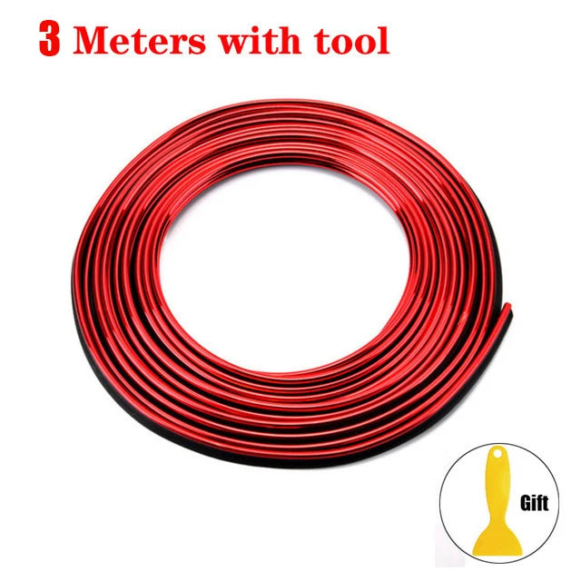 A coil of red universal car moulding trim strips with a tool.