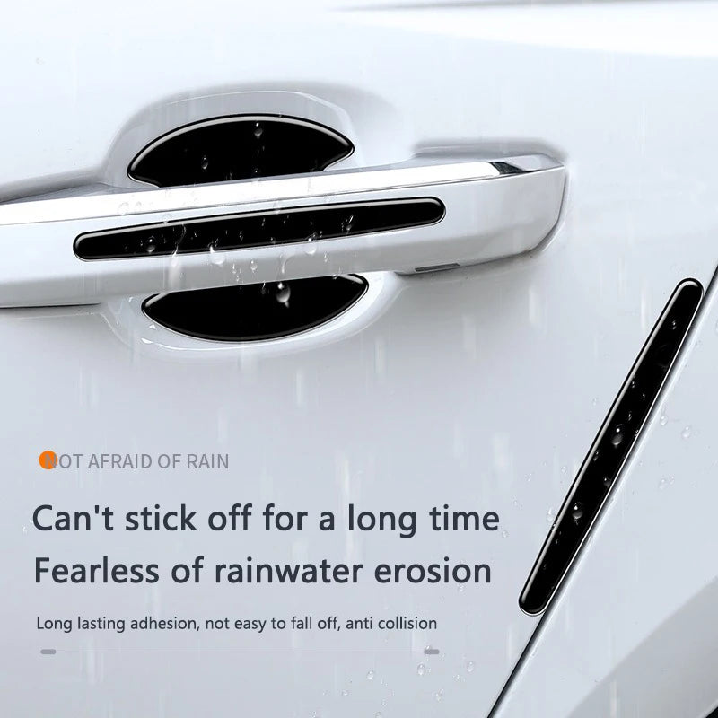 Close-up of a car door handle with protective stickers applied to prevent rainwater erosion.