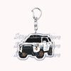 Silver acrylic keychain featuring a black off-road truck model.