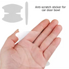 A hand is shown applying an anti-scratch sticker for a car door bowl onto the surface of the hand.