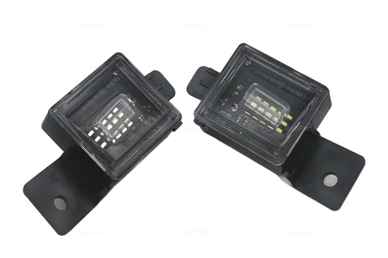 Pair of LED license plate lights for Chevy Silverado, GMC Sierra & Canyon vehicles