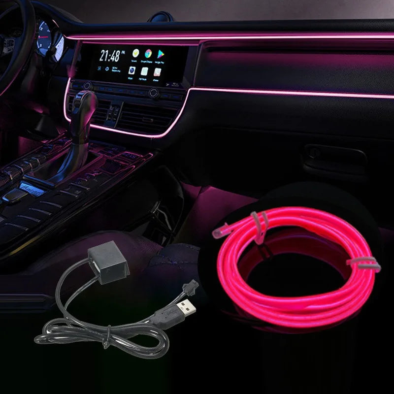 Flexible pink LED wire coiled in a car interior setting