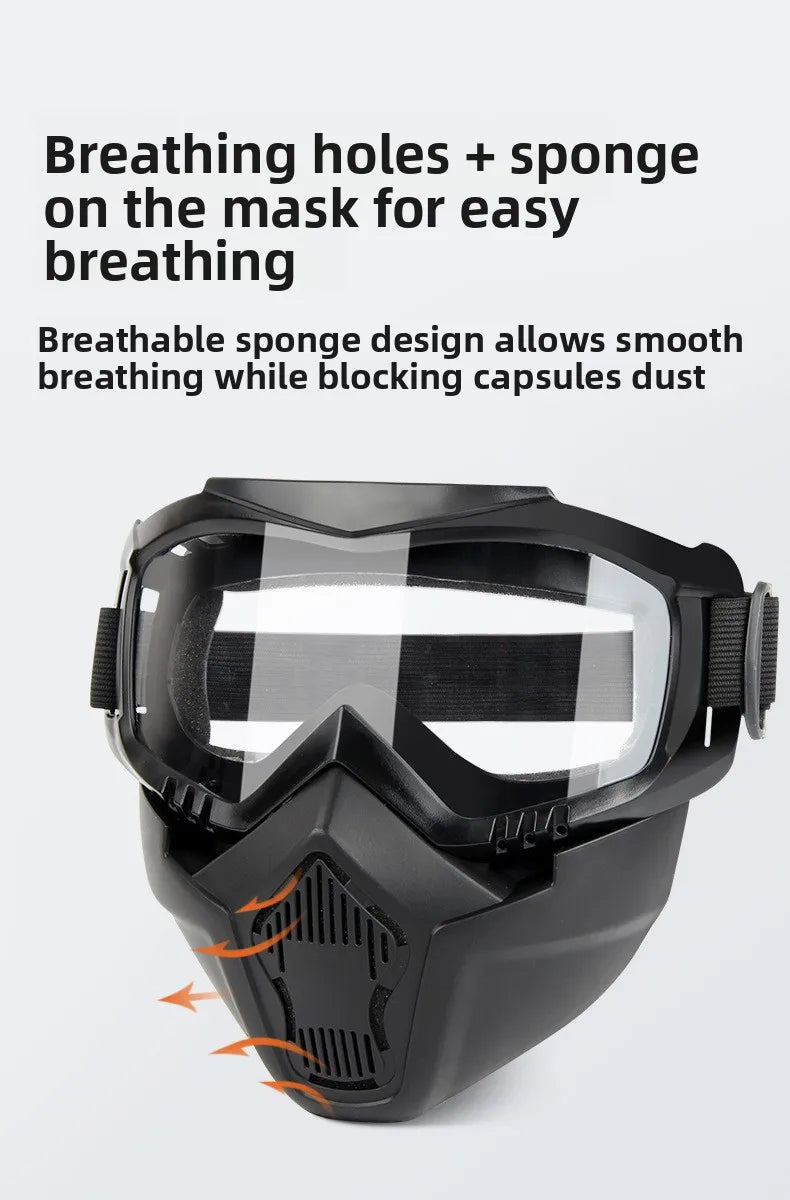 Black anti-fog goggles with breathing holes and sponge design shown on a person's face.