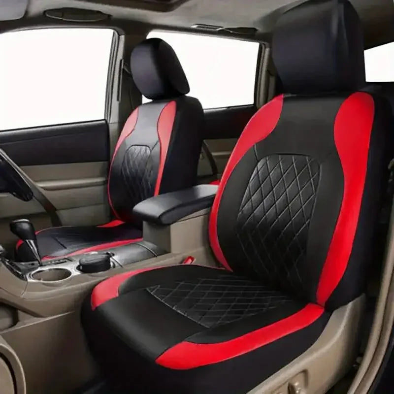 Interior view of a car seat with black and red leather covers installed on the seats.