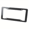Black carbon fiber license plate frame with mounting hardware.