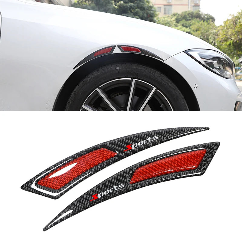 Carbon fiber sports trim for car headlight eyebrow protector and wheel accent.