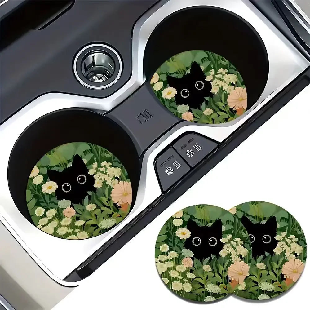 Dos soportes para vasos de coche antideslizantes con un diseño de gato negro y flor.