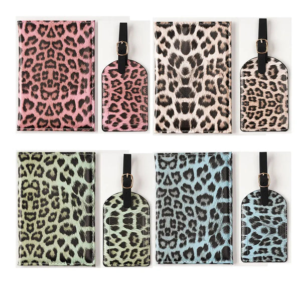 A collection of five leopard print passport holders in various shades and finishes.