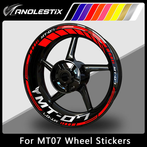 A black motorcycle wheel with red and white graphics and a yellow-to-blue color gradient bar above it, designed for decals.