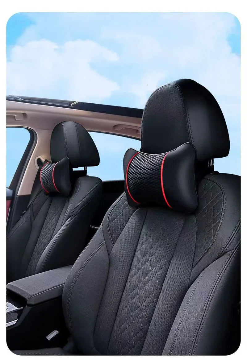 Black universal car headrest pillow designed for neck comfort shown in a vehicle interior.