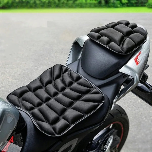 Black quilted seat covers installed on a motorcycle or electric bike.