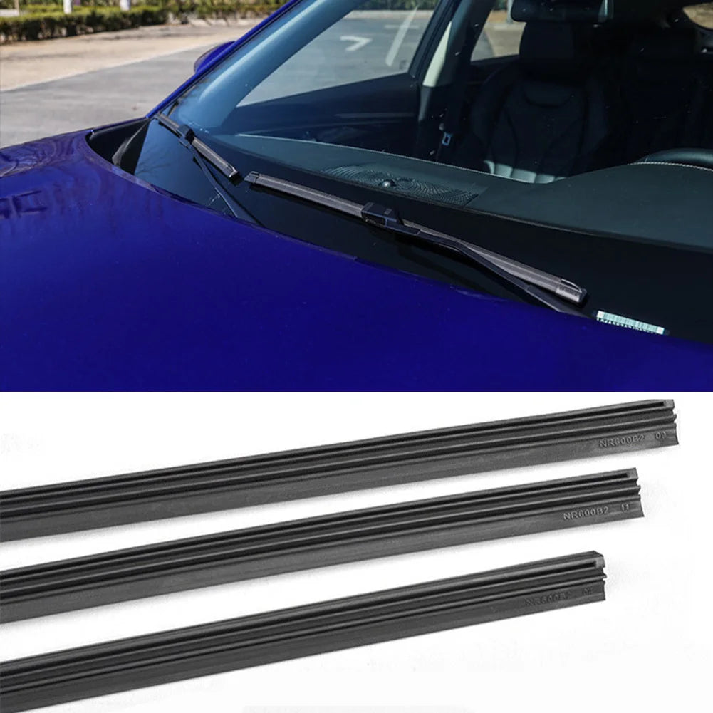 A close-up view of a black universal car windshield wiper blade insert made of natural rubber strip.