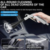A hand is using a high-pressure air blow car cleaning gun to clean the interior of a car.