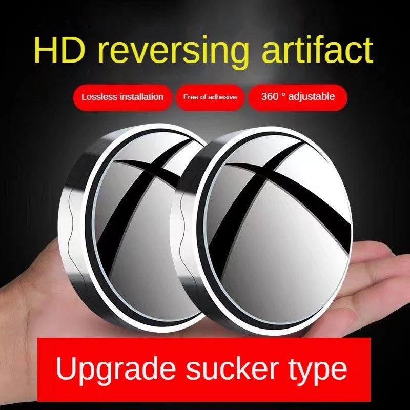 A hand holds two round suction cup rearview mirrors with an HD reversing artifact, designed for upgrade.