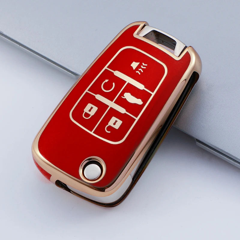 A red TPU key fob case with gold accents showing various key cutouts for Chevrolet and GMC models.