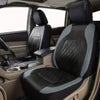 Interior view of a car with black and gray full coverage PU leather seat covers installed on the front seats.