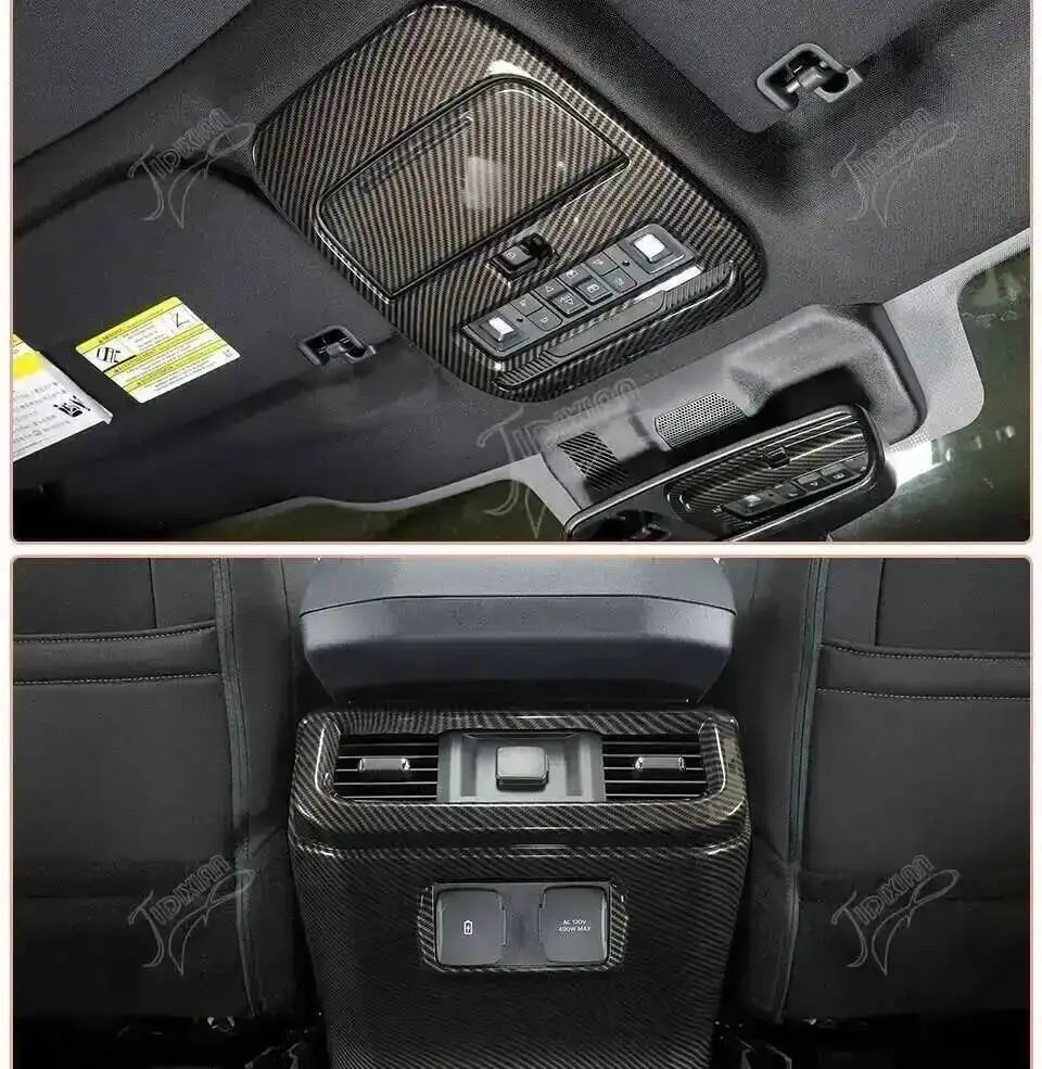 Close-up view of carbon fiber grain interior trim kit for a Ford F-150 showing controls and vents.