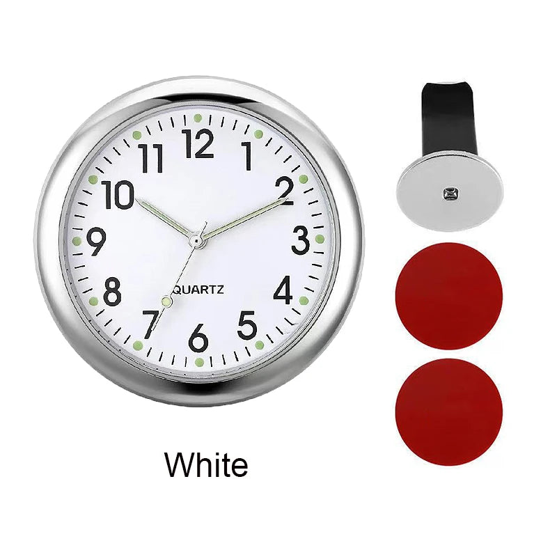 A silver round analog clock face with white background and black hands, shown next to replacement clock parts.