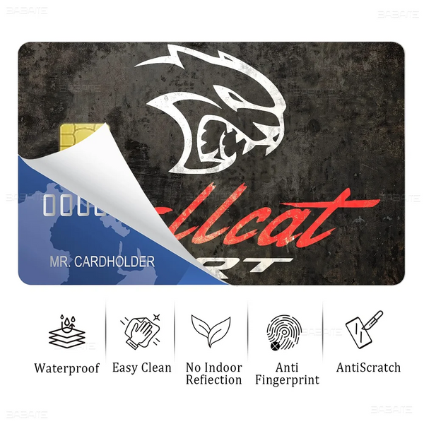 A close-up of an SRT Hellcat Demon Dodge card sticker film featuring a stylized black and white dragon head logo on a dark ba