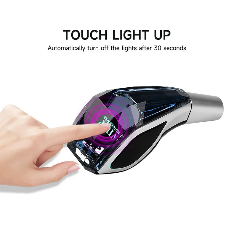 A hand touches an LED glowing gear shift knob for a manual transmission, which automatically turns off the lights after 30 se