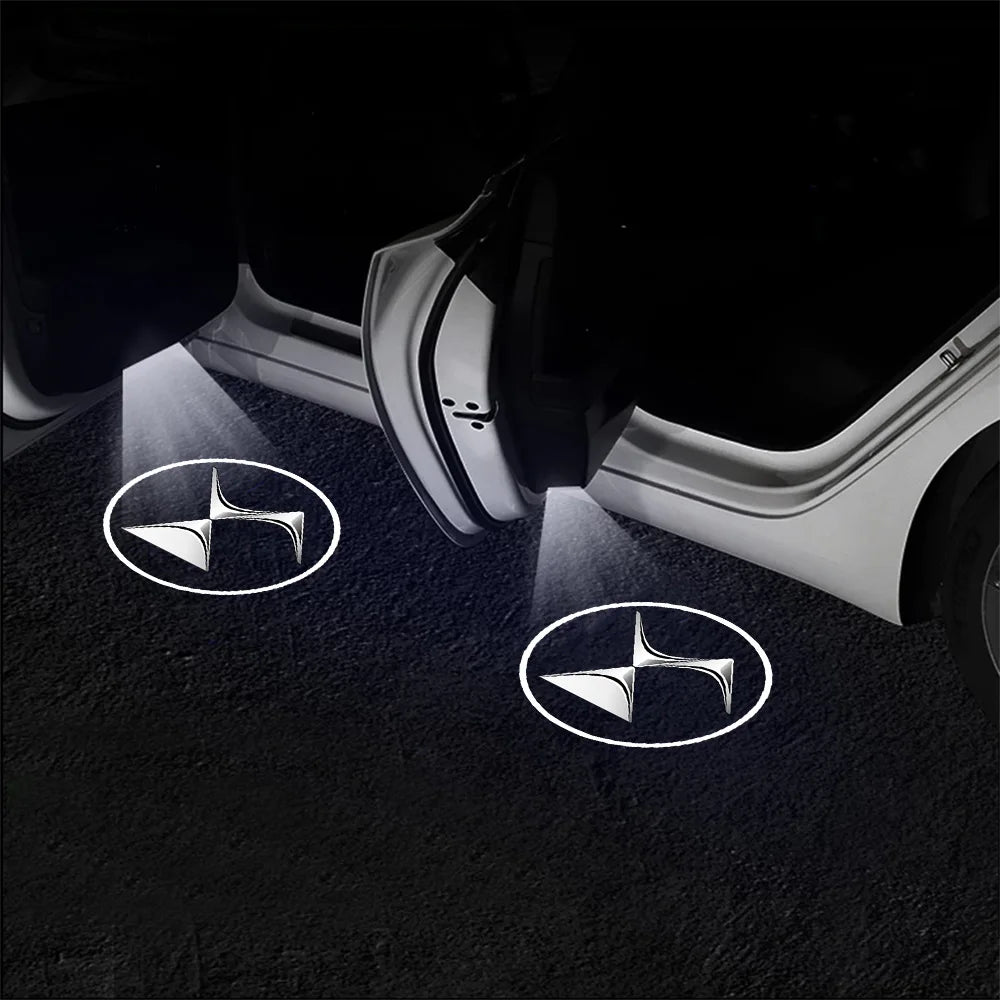 Wireless LED projector lights the floor with a Citroën logo design near a car door.