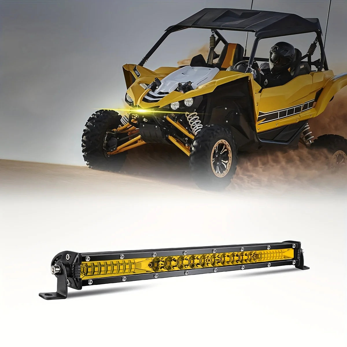 A yellow off-road vehicle is driving through dust with an ultra bright LED light bar mounted on the front.