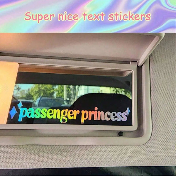 A close-up of a car interior window showing a text sticker that reads passenger princess