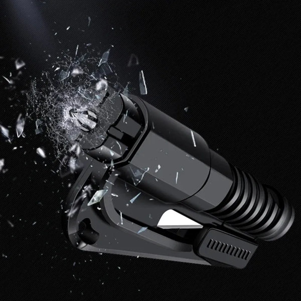 A black emergency car escape tool is shown exploding with shards of glass and metal against a dark background.