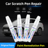 A set of white paint repair pens is shown next to a car, demonstrating the process for scratch repair and paint remediation.