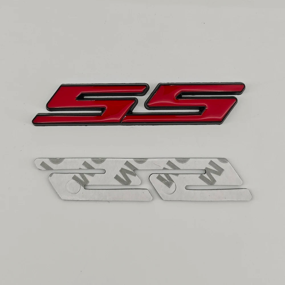 A red and black 3D metal SS/RS emblem badge for Chevrolet vehicles.