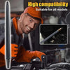A man wearing an orange shirt is using a car spark plug extractor tool on an engine component.