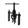A black three-claw bearing puller tool with a long shaft and gripping mechanism.
