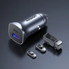 A silver Ugreen 30W dual-port USB-C fast car charger is shown on a dark surface with miniature cars.