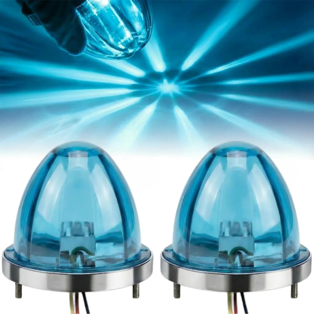 Two blue watermelon LED marker lights with silver bases and wiring visible against a bright background.
