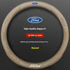 A round, beige steering wheel cover with a Ford logo printed on it.